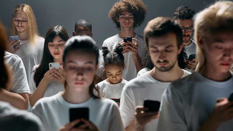 People looking at smartphones